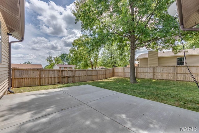 3534 Carriage Run Dr, Saint Charles, MO 63303 - fenced backyard with a patio area
