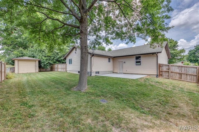 3534 Carriage Run Dr, Saint Charles, MO 63303 - back of house with a patio, a fenced backyard, and a detached garage