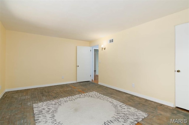 110 N 74th St, Belleville, IL 62223 - unfurnished room with wood finished floors and baseboards