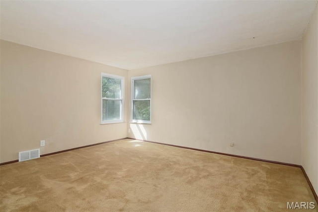 110 N 74th St, Belleville, IL 62223 - carpeted spare room with baseboards