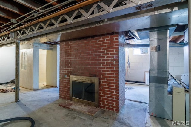 110 N 74th St, Belleville, IL 62223 - below grade area with a fireplace