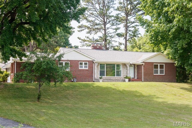 110 N 74th St, Belleville, IL 62223 - ranch-style house featuring a front yard, brick siding, a chimney, and stone siding