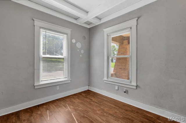 401 Estelle Ave, Ferguson, MO 63135 - empty room with dark wood-style floors and beamed ceiling
