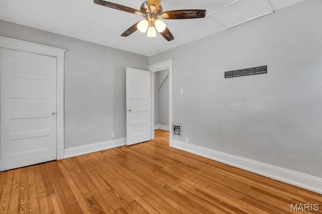401 Estelle Ave, Ferguson, MO 63135 - unfurnished bedroom with light wood-style floors and ceiling fan