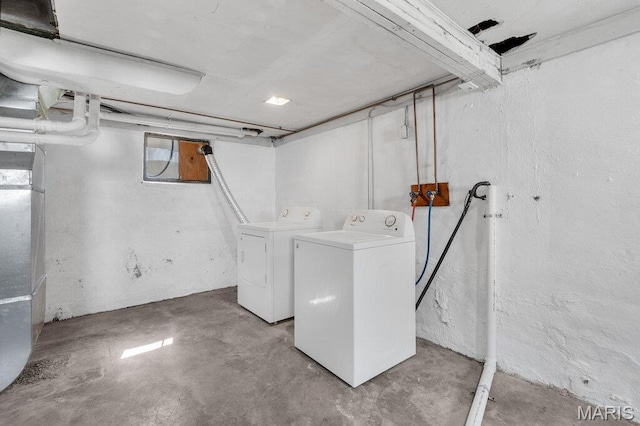 401 Estelle Ave, Ferguson, MO 63135 - laundry area with washing machine and clothes dryer and heating unit