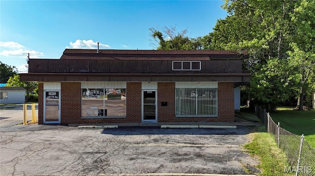 2801 High Ridge Blvd, High Ridge, MO 63049 - view of front facade with uncovered parking and brick siding
