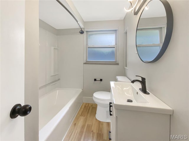 614 Conover Ln, Saint Louis, MO 63126 - bathroom featuring vanity, wood finished floors, and tub / shower combination