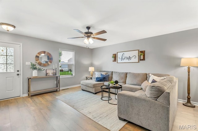 688 Rabbit Run Dr, Wentzville, MO 63385 - living room featuring light wood-type flooring and a ceiling fan