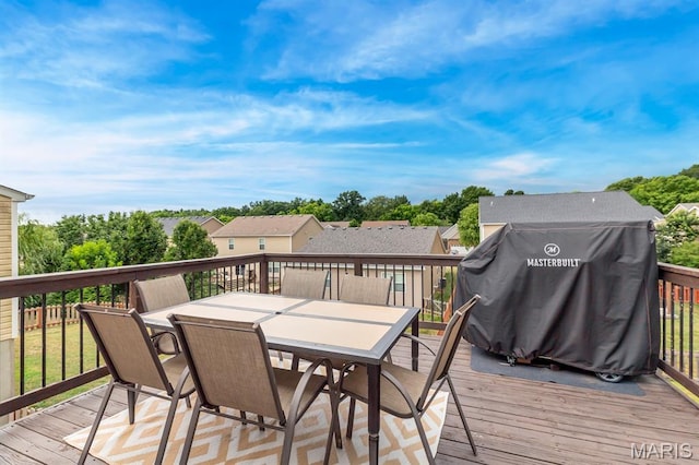 688 Rabbit Run Dr, Wentzville, MO 63385 - wooden deck with outdoor dining area and grilling area
