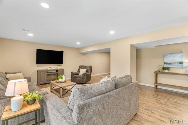 688 Rabbit Run Dr, Wentzville, MO 63385 - living area featuring light wood finished floors and recessed lighting