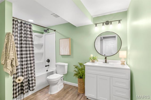 688 Rabbit Run Dr, Wentzville, MO 63385 - full bathroom featuring vanity, shower / tub combo with curtain, and wood finished floors