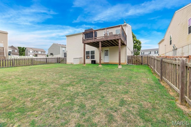 688 Rabbit Run Dr, Wentzville, MO 63385 - back of house with a fenced backyard and a wooden deck