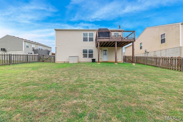 688 Rabbit Run Dr, Wentzville, MO 63385 - back of property with a wooden deck and a fenced backyard