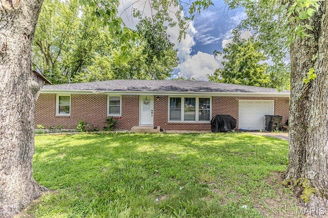 304 Warren St, Richland, MO 65556 - single story home with an attached garage, brick siding, and a front yard
