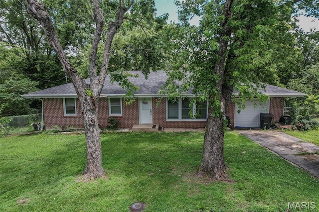 304 Warren St, Richland, MO 65556 - view of front of house with brick siding, driveway, roof with shingles, and an attached garage