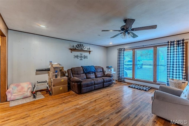 304 Warren St, Richland, MO 65556 - living area with wood finished floors, ceiling fan, and recessed lighting