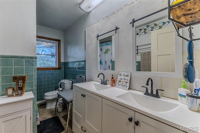 304 Warren St, Richland, MO 65556 - full bath featuring double vanity, tile walls, and wainscoting