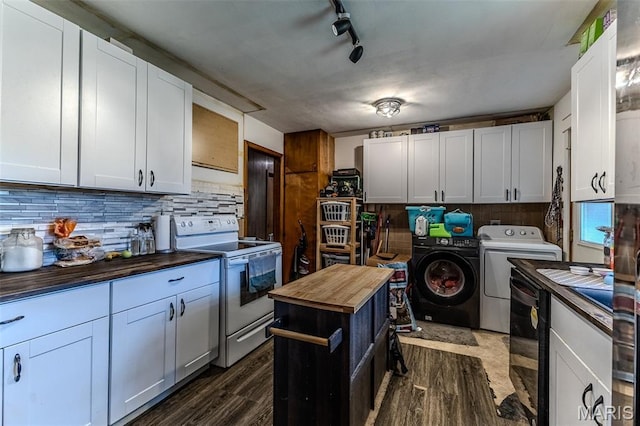 304 Warren St, Richland, MO 65556 - kitchen with white electric range, butcher block countertops, independent washer and dryer, tasteful backsplash, and dark wood finished floors