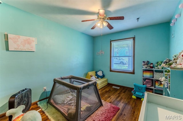 304 Warren St, Richland, MO 65556 - bedroom featuring wood finished floors and ceiling fan