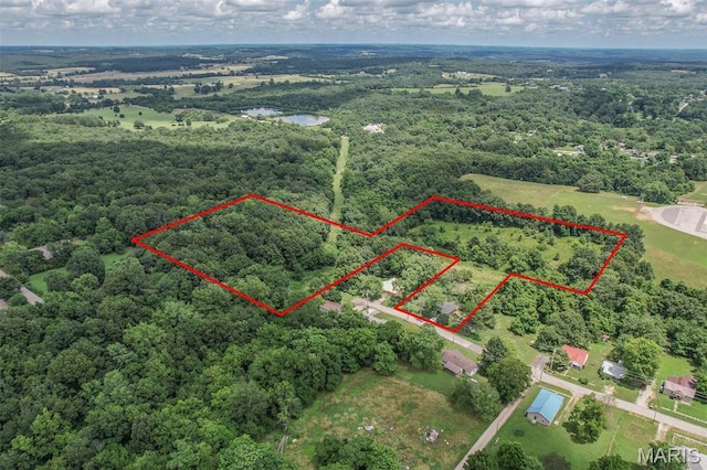 304 Warren St, Richland, MO 65556 - aerial view of property and surrounding area featuring property boundaries highlighted and a forest