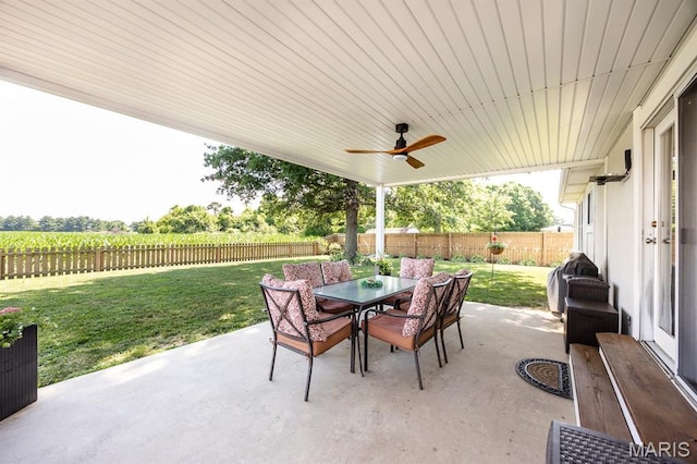 220 Southgate Dr, Freeburg, IL 62243 - fenced backyard featuring outdoor dining space, a patio, and a ceiling fan