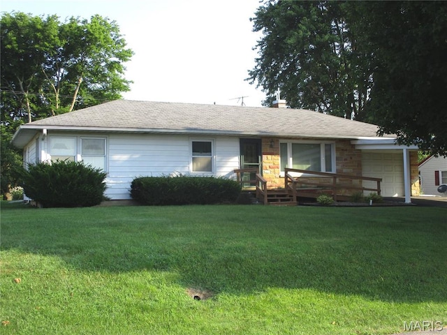 103 Paulette St, Chester, IL 62233 - single story home with an attached garage, a front lawn, a chimney, and roof with shingles