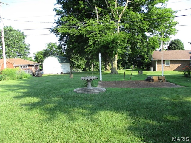 103 Paulette St, Chester, IL 62233 - view of grassy yard with a storage unit