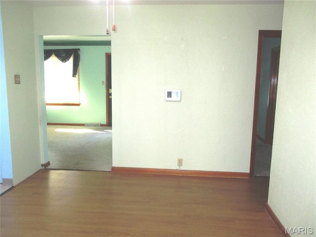 103 Paulette St, Chester, IL 62233 - unfurnished room featuring wood finished floors and baseboards