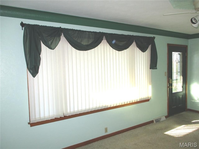 103 Paulette St, Chester, IL 62233 - entrance foyer with carpet floors and ceiling fan