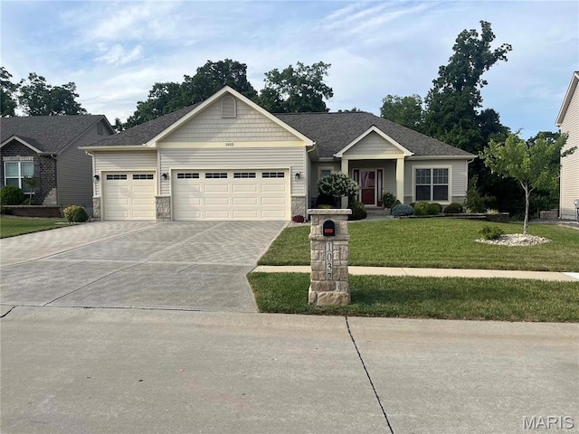 1032 Timber Bluff Dr, Wentzville, MO 63385 - view of front facade featuring a garage, a front yard, driveway, and stone siding