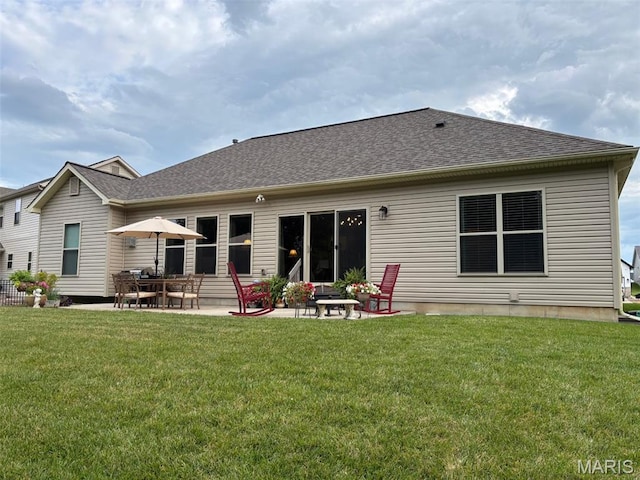 1032 Timber Bluff Dr, Wentzville, MO 63385 - rear view of property featuring a patio, a yard, and roof with shingles