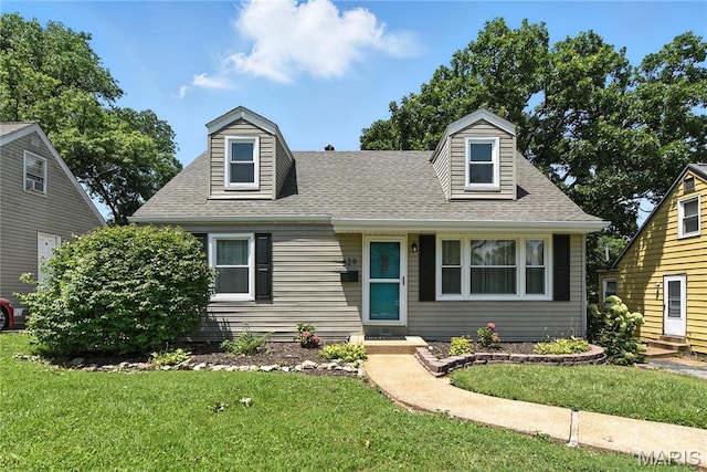 429 Belvedere Ln, Glendale, MO 63122 - cape cod-style house featuring a front lawn and a shingled roof