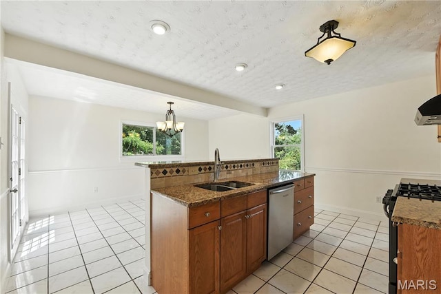 429 Belvedere Ln, Glendale, MO 63122 - kitchen with stainless steel dishwasher, light tile patterned floors, range with gas stovetop, brown cabinets, and recessed lighting