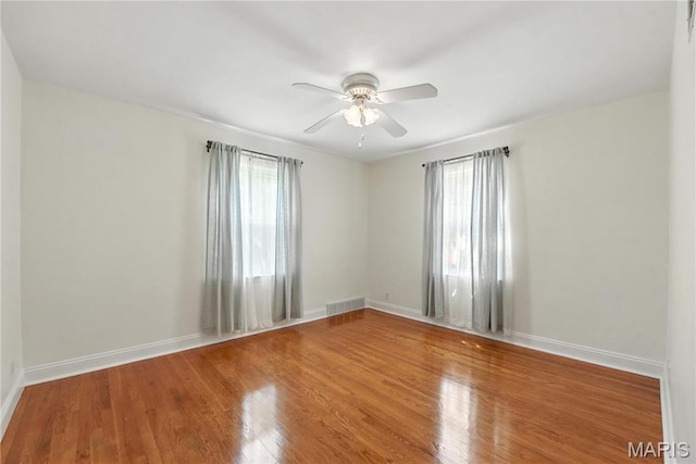 429 Belvedere Ln, Glendale, MO 63122 - unfurnished room featuring wood finished floors and a ceiling fan