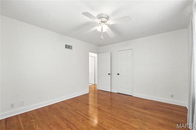 429 Belvedere Ln, Glendale, MO 63122 - unfurnished bedroom with wood finished floors and a ceiling fan