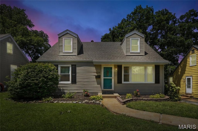 429 Belvedere Ln, Glendale, MO 63122 - cape cod-style house with a front lawn and roof with shingles