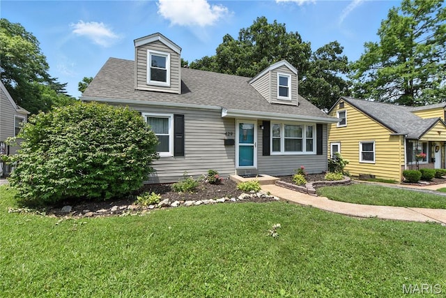 429 Belvedere Ln, Glendale, MO 63122 - cape cod-style house featuring a front lawn and roof with shingles