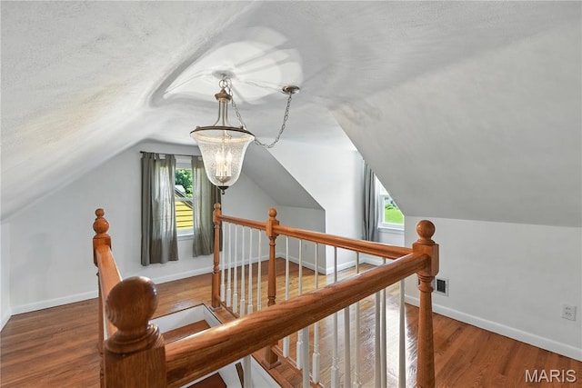 429 Belvedere Ln, Glendale, MO 63122 - bonus room with lofted ceiling and wood finished floors