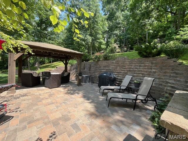 1333 Poor Farm Hollow Rd, Hardin, IL 62047 - view of patio with a gazebo, area for grilling, an outdoor living space, and view of wooded area