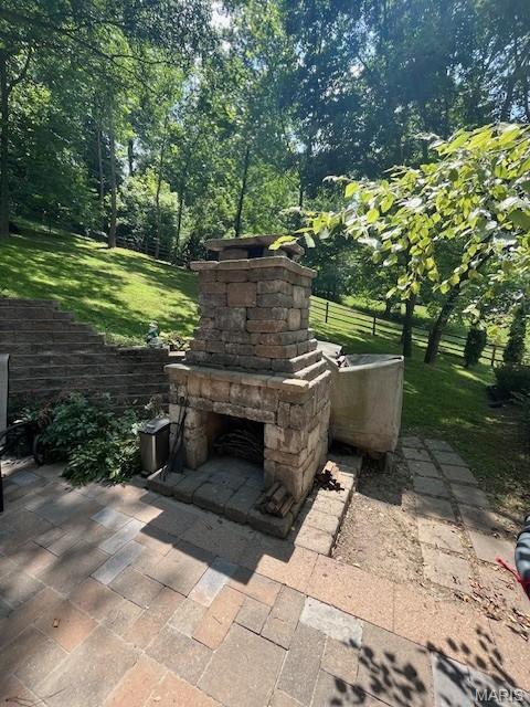 1333 Poor Farm Hollow Rd, Hardin, IL 62047 - view of patio / terrace featuring an outdoor stone fireplace