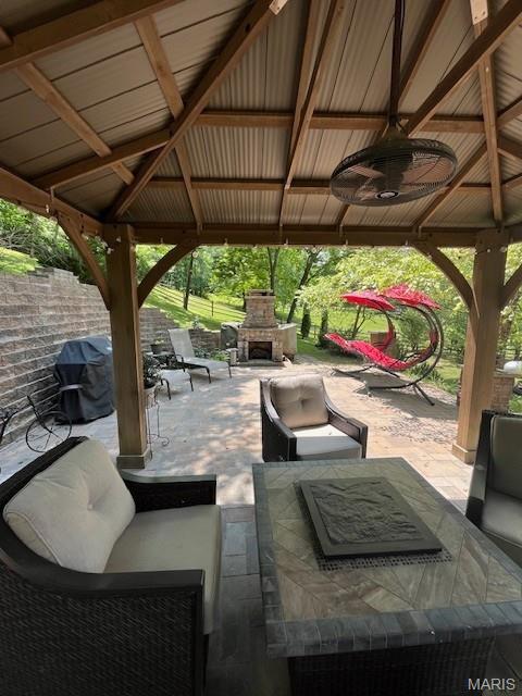 1333 Poor Farm Hollow Rd, Hardin, IL 62047 - view of patio / terrace featuring a gazebo, an outdoor living space with a fireplace, and ceiling fan