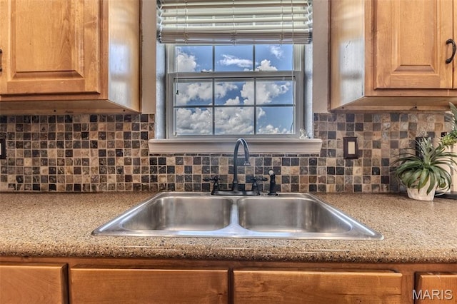 143 Lyle Curtis Cir, Waynesville, MO 65583 - kitchen view of backsplash and brown cabinetry