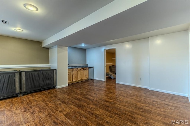 143 Lyle Curtis Cir, Waynesville, MO 65583 - finished basement with dark wood finished floors and baseboards