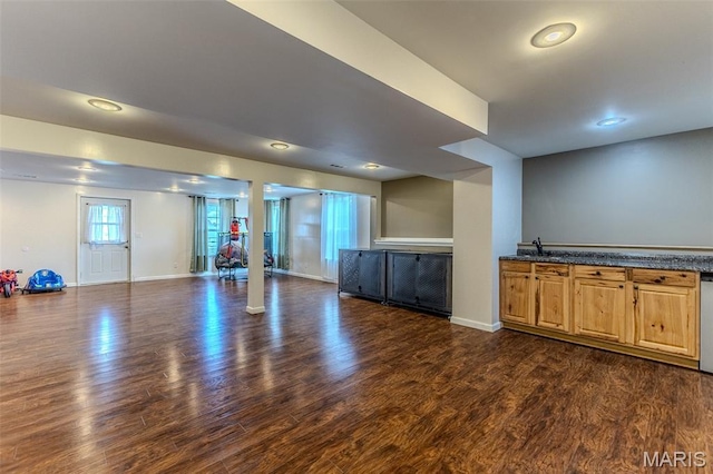 143 Lyle Curtis Cir, Waynesville, MO 65583 - basement featuring dark wood-style floors, recessed lighting, and bar area
