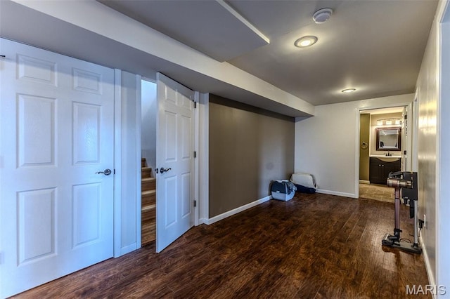 143 Lyle Curtis Cir, Waynesville, MO 65583 - below grade area featuring baseboards and dark wood finished floors