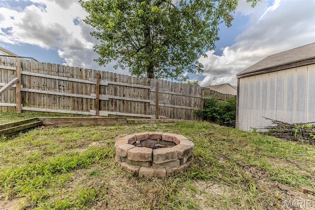 143 Lyle Curtis Cir, Waynesville, MO 65583 - view of yard with a fire pit