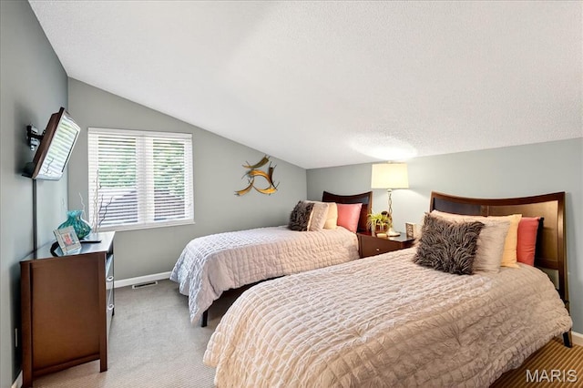 2 Tanewood Ct, Belleville, IL 62223 - carpeted bedroom with lofted ceiling and baseboards