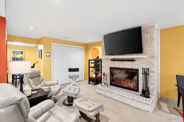 2 Tanewood Ct, Belleville, IL 62223 - living room featuring light tile patterned floors, a fireplace, and recessed lighting
