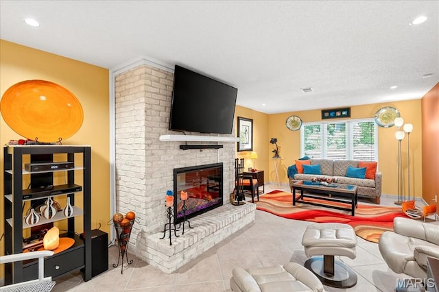 2 Tanewood Ct, Belleville, IL 62223 - tiled living room with a fireplace and recessed lighting