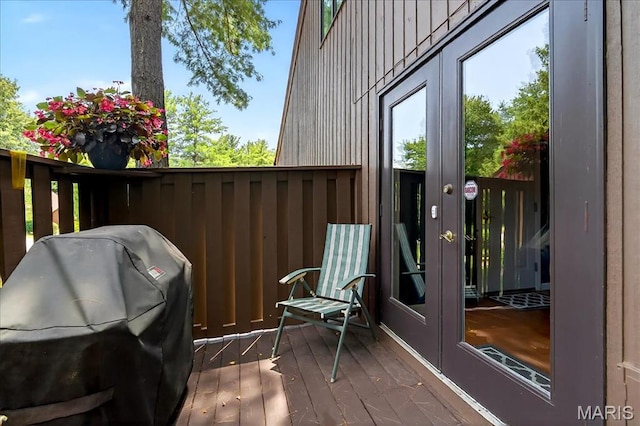 2 Tanewood Ct, Belleville, IL 62223 - wooden terrace with french doors and grilling area